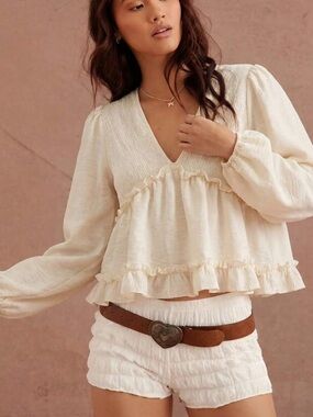 Smocked V-Neck Ruffle Blouse in Cream